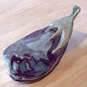 Small ceramic eggplant, spoon rest? Handmade, has a little stand on the back